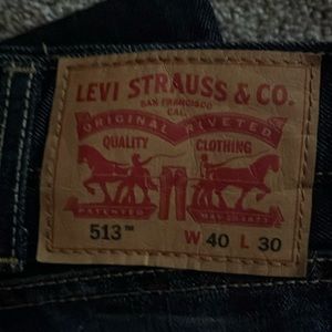 Levi’s 513 dark wash jeans never worn